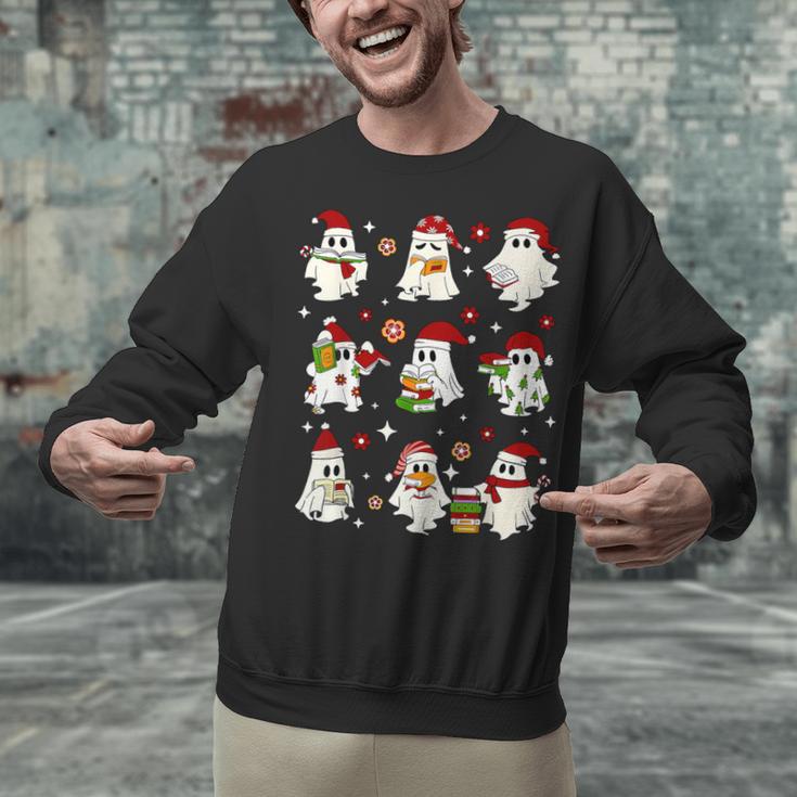 Santa Ghost Reading Books Christmas Library Teacher Unisex Sweatshirt, gift for family, gift for coworker Santa Ghost Reading Books Christmas Library Teacher Unisex Sweatshirt, gift for family, gift for coworker