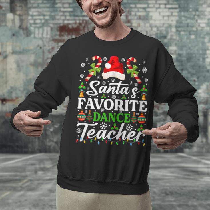Santa's Favorite Dance Teacher Shirt Christmas Pajama Unisex Sweatshirt, gift for family, gift for coworker Santa's Favorite Dance Teacher Shirt Christmas Pajama Unisex Sweatshirt, gift for family, gift for coworker