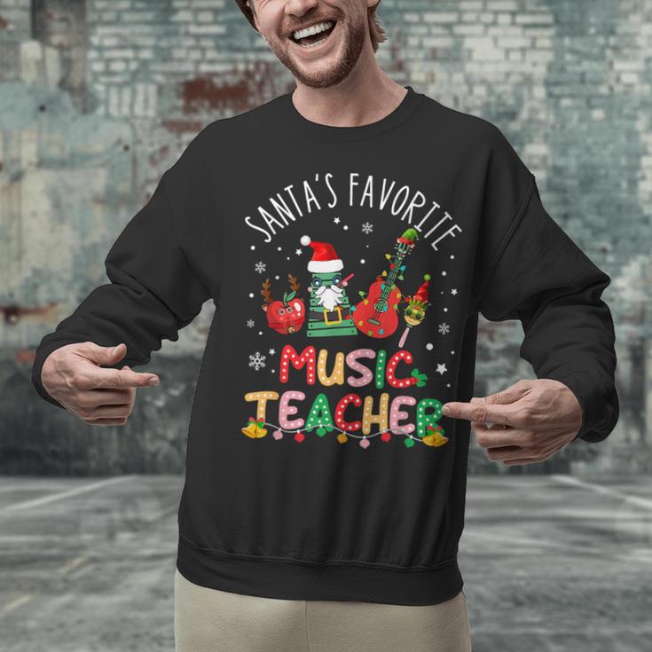 Santa's Favorite Music Teacher Christmas Santa Hat Matching Unisex Sweatshirt, gift for family, gift for coworker Santa's Favorite Music Teacher Christmas Santa Hat Matching Unisex Sweatshirt, gift for family, gift for coworker
