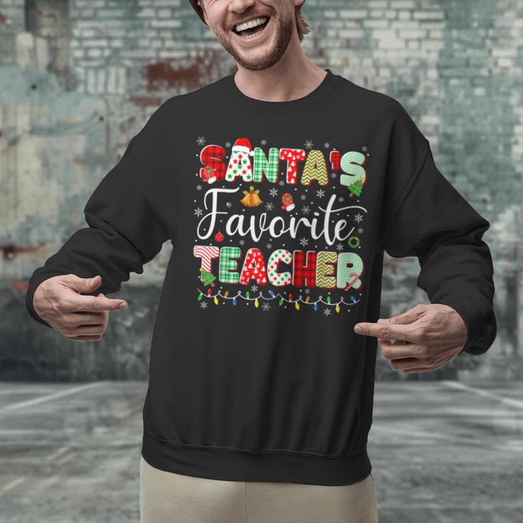 Santas Favorite Teacher Christmas Matching Xmas Men Women Unisex Sweatshirt, gift for family, gift for coworker Santas Favorite Teacher Christmas Matching Xmas Men Women Unisex Sweatshirt, gift for family, gift for coworker
