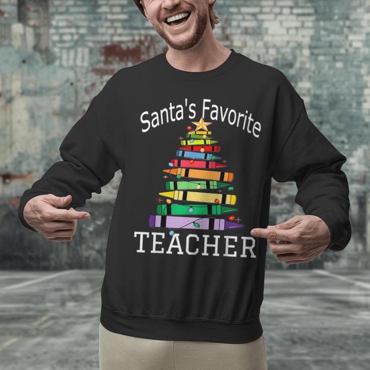 Santa's Favorite Teacher Idea For Christmas Teachers Unisex Sweatshirt, gift for family, gift for coworker Santa's Favorite Teacher Idea For Christmas Teachers Unisex Sweatshirt, gift for family, gift for coworker