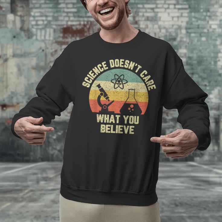 Science Doesn't Care What You Believe Science Teacher Men Women Kids Unisex Sweatshirt, Science Teacher Sweatshirts, gift for family, gift for coworker Science Doesn't Care What You Believe Science Teacher Men Women Kids Unisex Sweatshirt, Science Teacher Sweatshirts, gift for family, gift for coworker