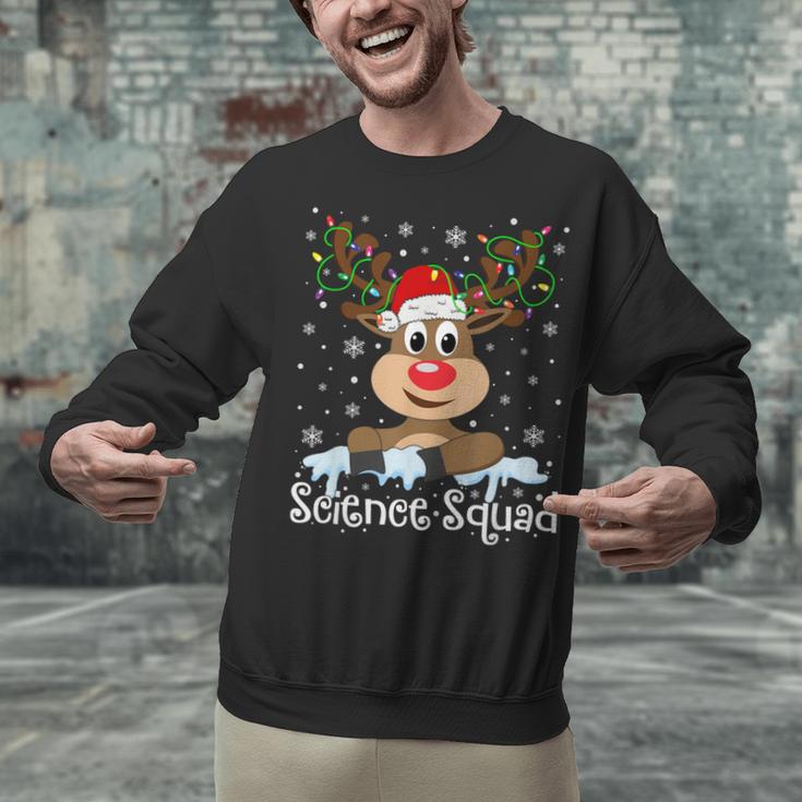 Science Teacher Squad Reindeer Christmas Teacher Xmas Lights For Men Women Unisex Sweatshirt, Science Teacher Sweatshirts, gift for family, gift for coworker