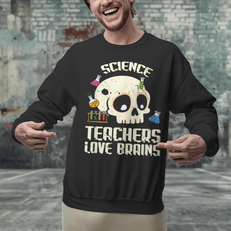 Science Teachers Love Brains Teachers Halloween Unisex Sweatshirt, Science Teacher Sweatshirts, gift for family, gift for coworker Science Teachers Love Brains Teachers Halloween Unisex Sweatshirt, Science Teacher Sweatshirts, gift for family, gift for coworker