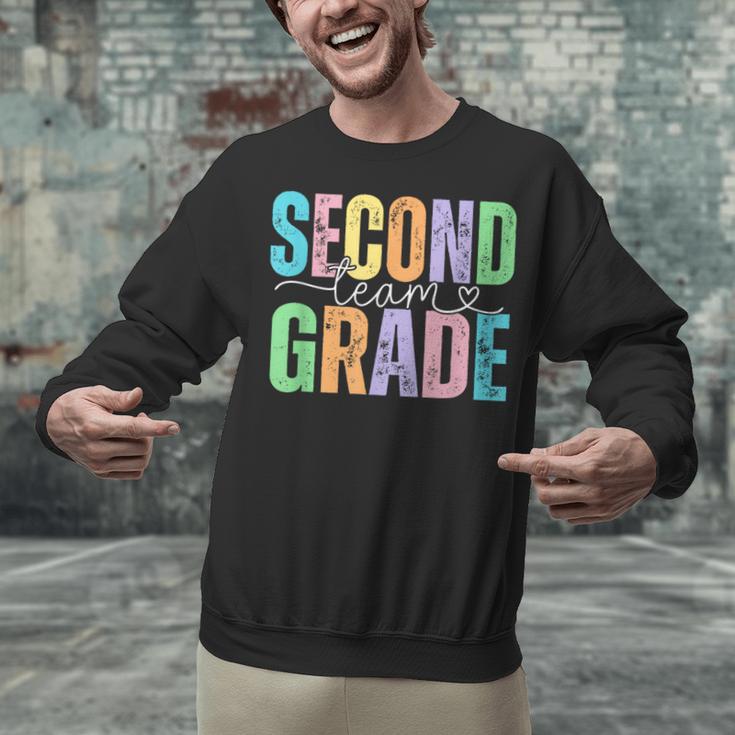 Second Grade Team Heart Teacher Student Back To School Girls Unisex Sweatshirt, gift for family, gift for coworker Second Grade Team Heart Teacher Student Back To School Girls Unisex Sweatshirt, gift for family, gift for coworker