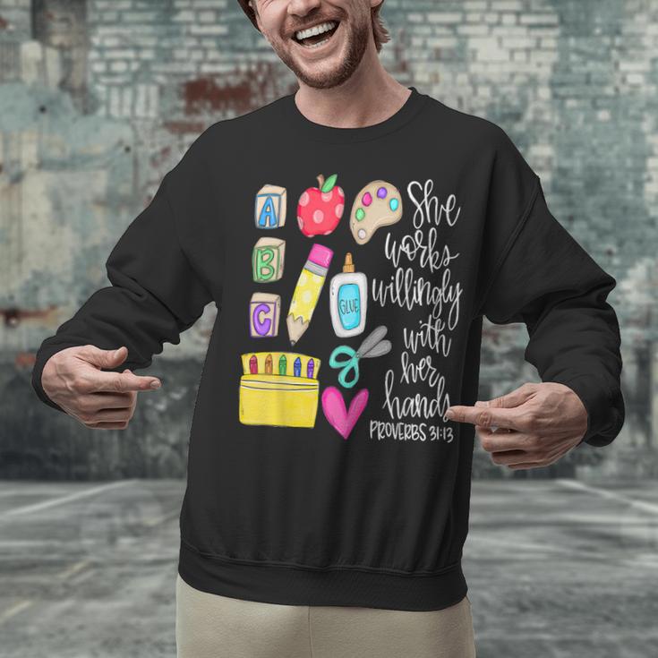 She Works Willingly With Her Hands Proverbs Daycare Teacher Men Women Unisex Sweatshirt, gift for family, gift for coworker