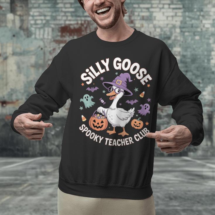Silly Goose Spooky Teacher Club Halloween Witch Ghost Unisex Sweatshirt, gift for family, gift for coworker Silly Goose Spooky Teacher Club Halloween Witch Ghost Unisex Sweatshirt, gift for family, gift for coworker