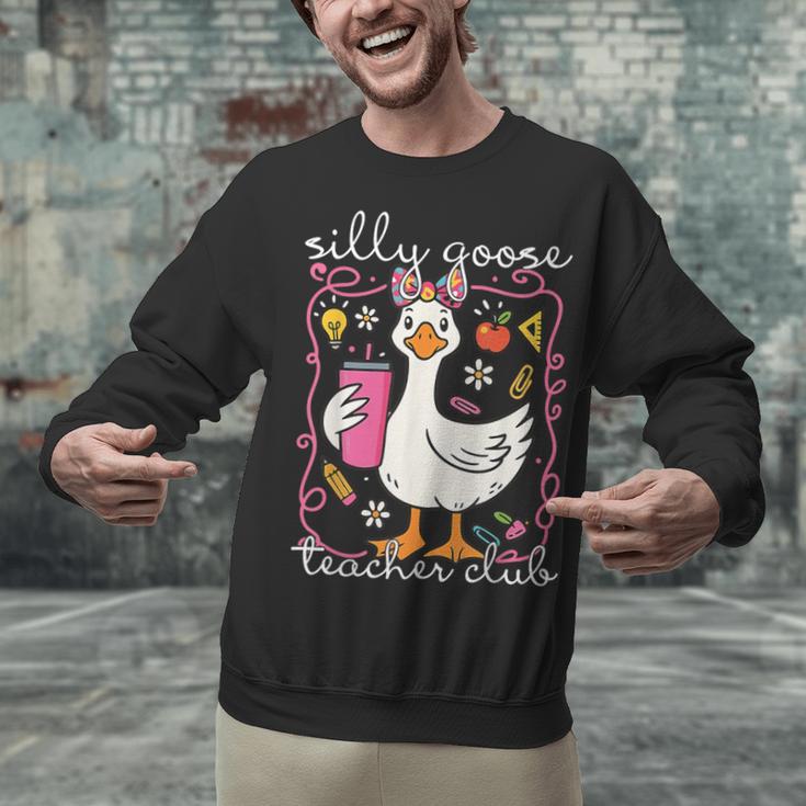 Silly Goose Teacher Club Animal Lover Groovy Teacher Unisex Sweatshirt, Groovy Teacher Sweatshirts, gift for family, gift for coworker