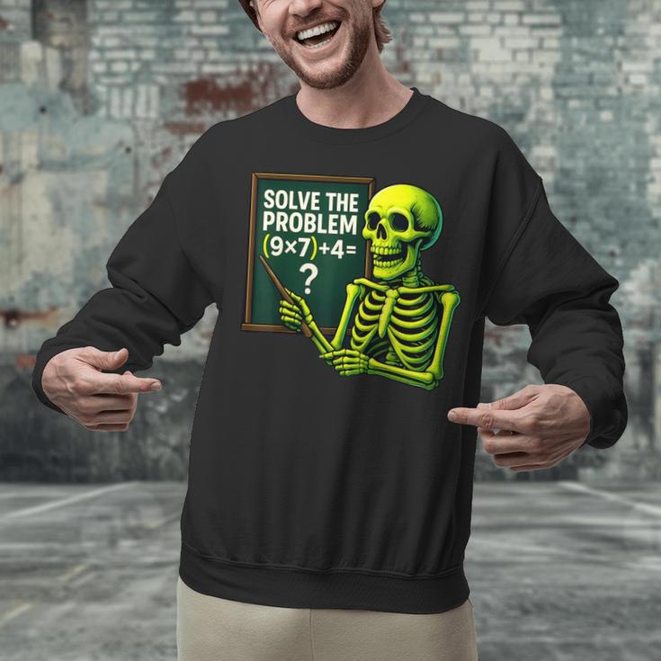 Solve The Problem Skeleton Teacher Halloween Math Six Seven Unisex Sweatshirt, gift for family, gift for coworker Solve The Problem Skeleton Teacher Halloween Math Six Seven Unisex Sweatshirt, gift for family, gift for coworker