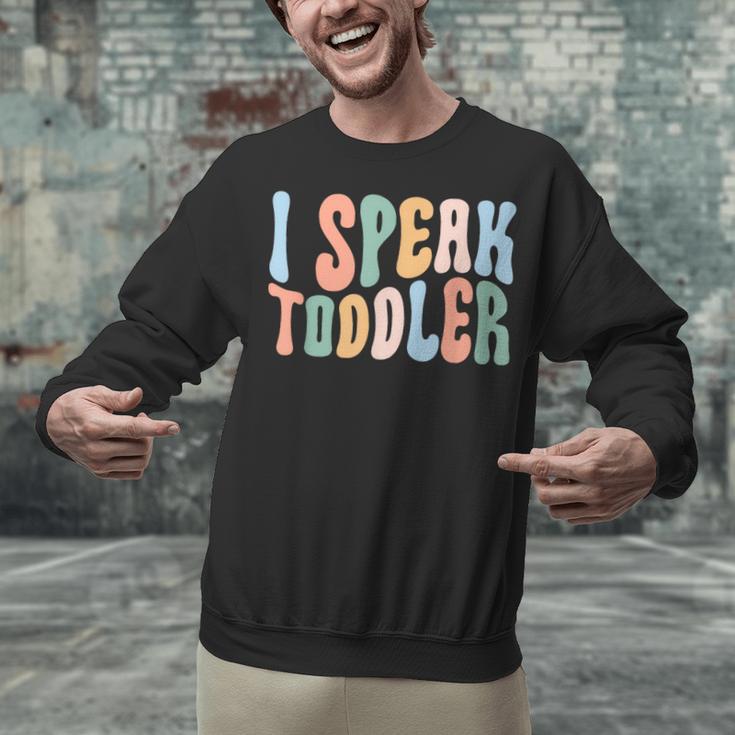 I Speak Toddler Teacher Pre School Back To School First Day Unisex Sweatshirt, gift for family, gift for coworker I Speak Toddler Teacher Pre School Back To School First Day Unisex Sweatshirt, gift for family, gift for coworker