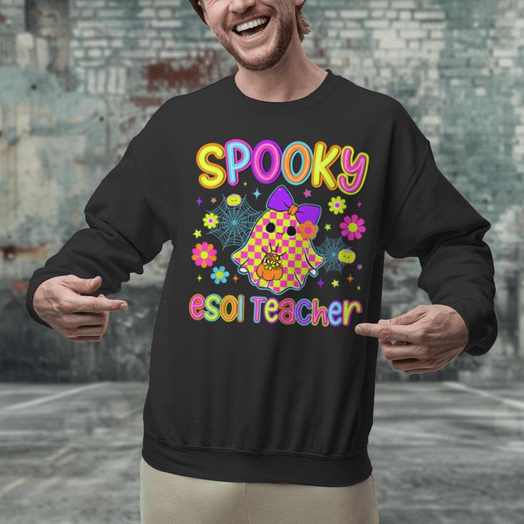 Spooky ESOL Teacher Halloween ESOL Teaching Coquette Unisex Sweatshirt, gift for family, gift for coworker Spooky ESOL Teacher Halloween ESOL Teaching Coquette Unisex Sweatshirt, gift for family, gift for coworker