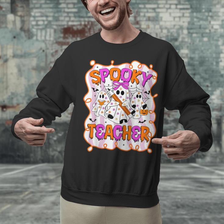 Spooky Teacher Ghost Pencil Teacher Halloween Teacher Unisex Sweatshirt, gift for family, gift for coworker Spooky Teacher Ghost Pencil Teacher Halloween Teacher Unisex Sweatshirt, gift for family, gift for coworker