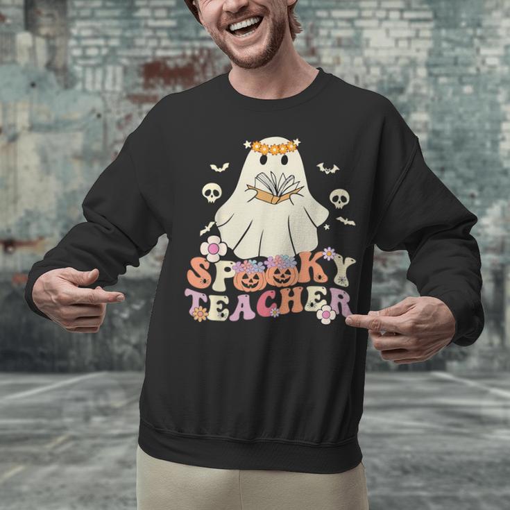 Spooky Teacher Groovy Retro Ghost Teacher Halloween 2023 For Men Women Kids Unisex Sweatshirt, Groovy Teacher Sweatshirts, gift for family, gift for coworker Spooky Teacher Groovy Retro Ghost Teacher Halloween 2023 For Men Women Kids Unisex Sweatshirt, Groovy Teacher Sweatshirts, gift for family, gift for coworker