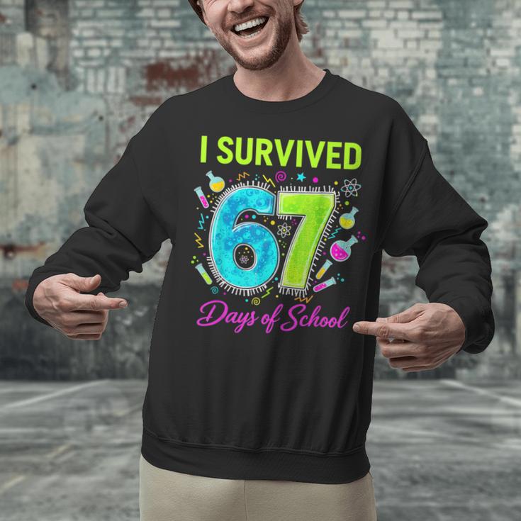 I Survived 67 Days Of School 67 Meme Science Teacher Unisex Sweatshirt, Science Teacher Sweatshirts, gift for family, gift for coworker I Survived 67 Days Of School 67 Meme Science Teacher Unisex Sweatshirt, Science Teacher Sweatshirts, gift for family, gift for coworker