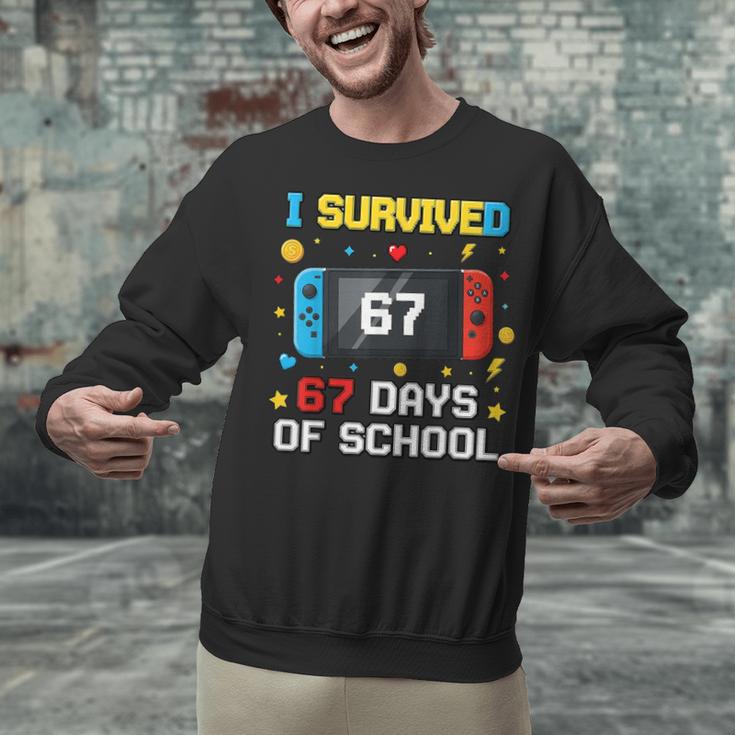 I Survived 67 Days Of School 67 Teacher Squad Matching Unisex Sweatshirt, gift for family, gift for coworker I Survived 67 Days Of School 67 Teacher Squad Matching Unisex Sweatshirt, gift for family, gift for coworker