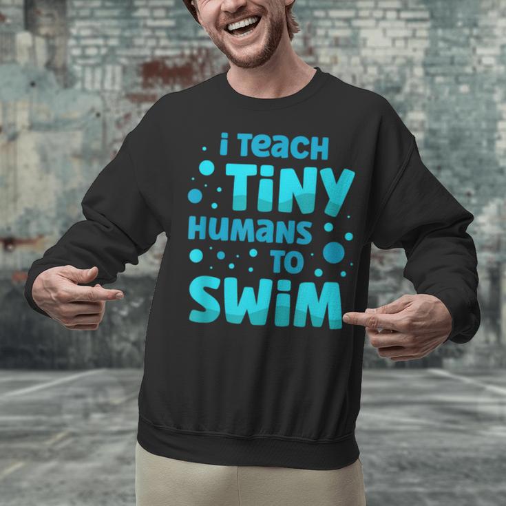 Swimming Teacher I Teach Tiny Humans To Swim Swim Instructor Unisex Sweatshirt, gift for family, gift for coworker Swimming Teacher I Teach Tiny Humans To Swim Swim Instructor Unisex Sweatshirt, gift for family, gift for coworker