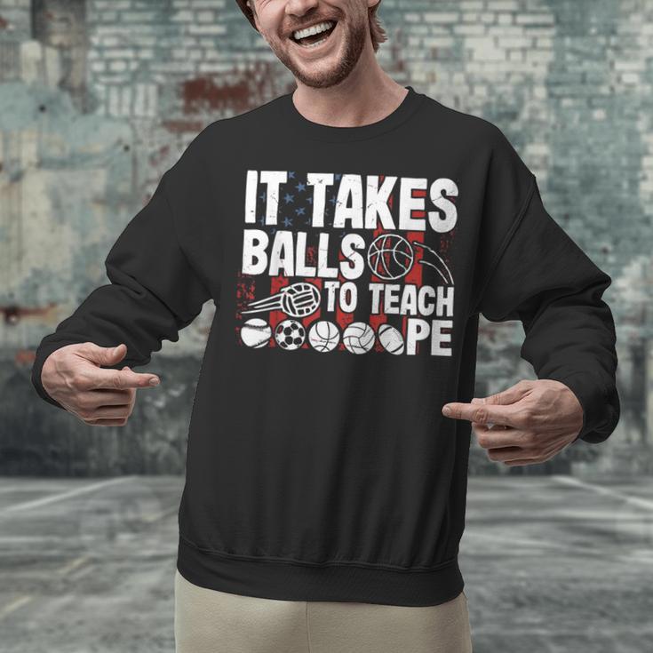 It Takes Balls To Teach Pe Teacher Chaos Coordinator US Flag Unisex Sweatshirt, Pe Teacher Sweatshirts, gift for family, gift for coworker It Takes Balls To Teach Pe Teacher Chaos Coordinator US Flag Unisex Sweatshirt, Pe Teacher Sweatshirts, gift for family, gift for coworker