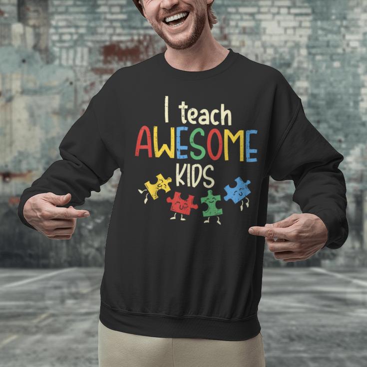I Teach Awesome Kids Shirt Autism Special Education Teacher Unisex Sweatshirt, gift for family, gift for coworker