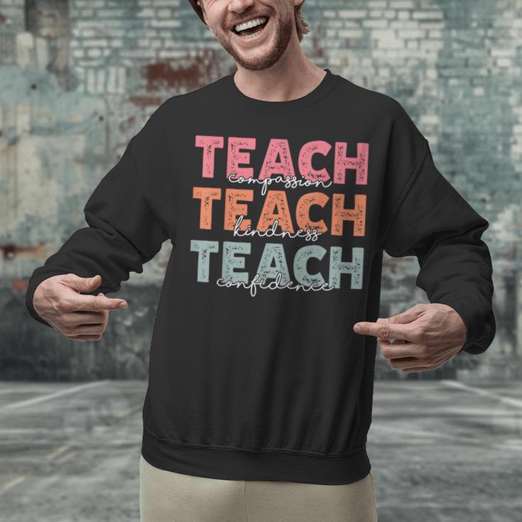 Teach Compassion Kindness Confidence For Teacher Unisex Sweatshirt, gift for family, gift for coworker Teach Compassion Kindness Confidence For Teacher Unisex Sweatshirt, gift for family, gift for coworker