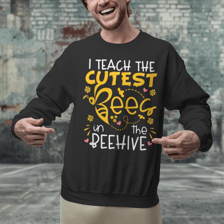 I Teach The Cutest Bees In The Beehive Teacher Unisex Sweatshirt, gift for family, gift for coworker I Teach The Cutest Bees In The Beehive Teacher Unisex Sweatshirt, gift for family, gift for coworker