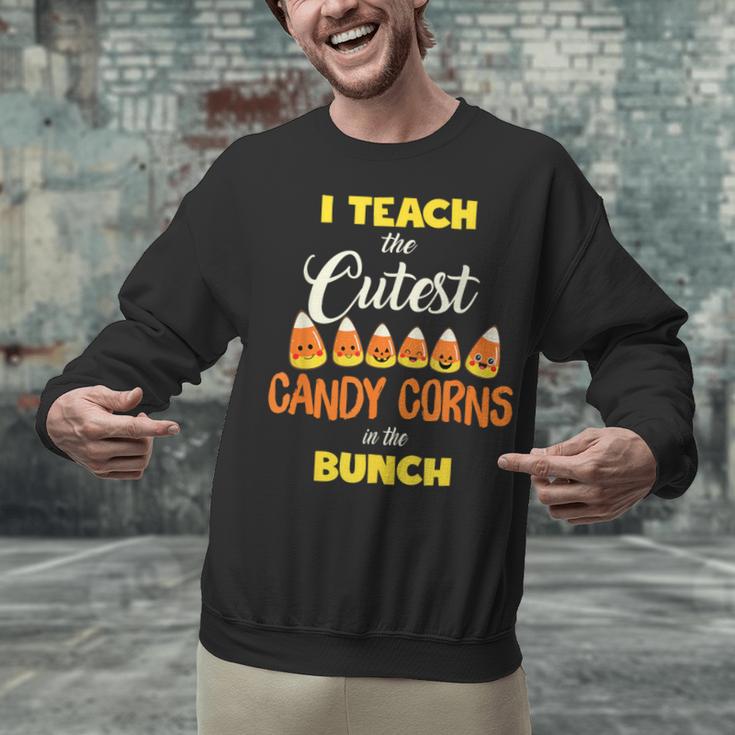 I Teach The Cutest Candy Corn In The Patch Teacher Halloween Unisex Sweatshirt, gift for family, gift for coworker