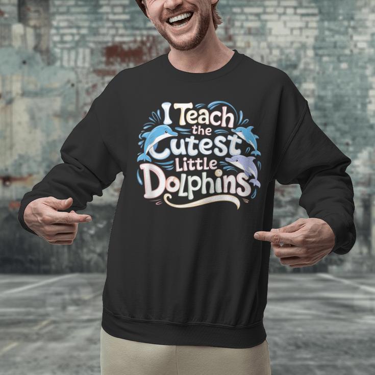 I Teach The Cutest Little Dolphins Cute Animal Teacher Unisex Sweatshirt, gift for family, gift for coworker I Teach The Cutest Little Dolphins Cute Animal Teacher Unisex Sweatshirt, gift for family, gift for coworker