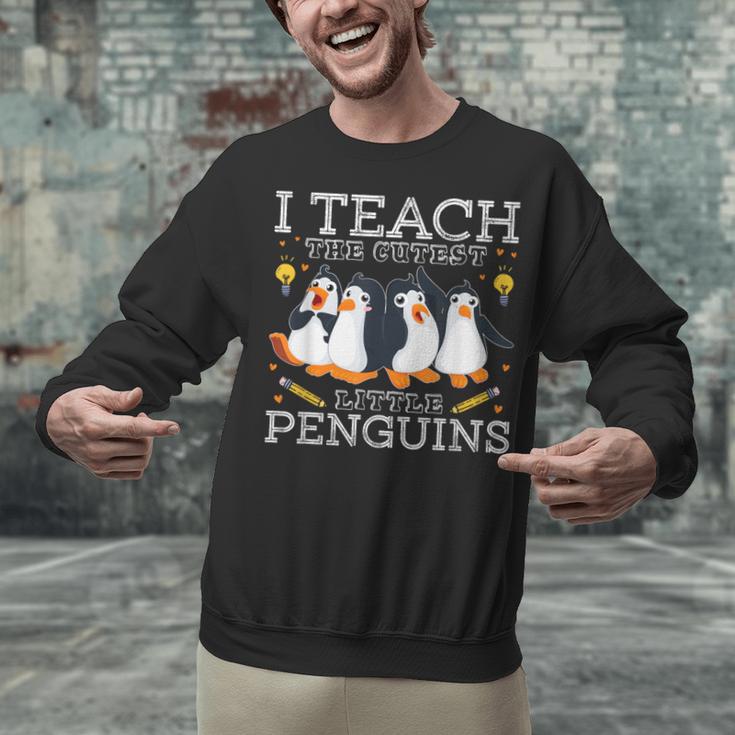 I Teach The Cutest Little Penguins Cute School Teacher Tee Unisex Sweatshirt, gift for family, gift for coworker I Teach The Cutest Little Penguins Cute School Teacher Tee Unisex Sweatshirt, gift for family, gift for coworker