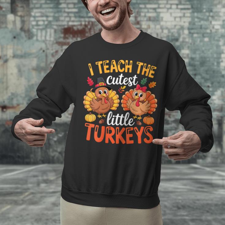 I Teach The Cutest Little Turkeys Teacher Thanksgiving Unisex Sweatshirt, gift for family, gift for coworker I Teach The Cutest Little Turkeys Teacher Thanksgiving Unisex Sweatshirt, gift for family, gift for coworker