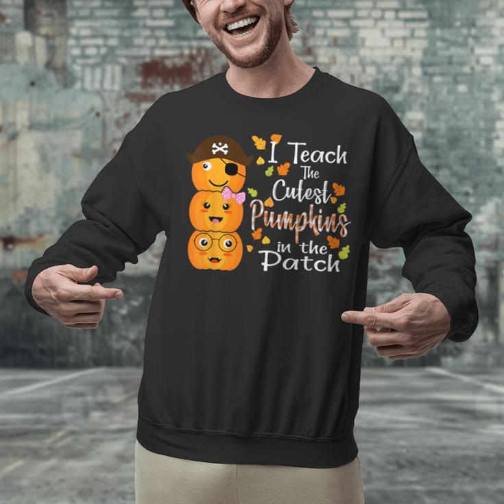 I Teach The Cutest Pumpkins Halloween Shirt For Teachers Unisex Sweatshirt, gift for family, gift for coworker I Teach The Cutest Pumpkins Halloween Shirt For Teachers Unisex Sweatshirt, gift for family, gift for coworker