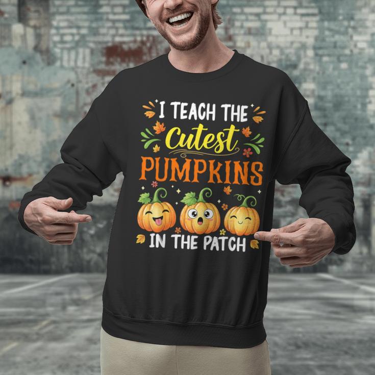 I Teach The Cutest Pumpkins Halloween Teacher Unisex Sweatshirt, gift for family, gift for coworker I Teach The Cutest Pumpkins Halloween Teacher Unisex Sweatshirt, gift for family, gift for coworker