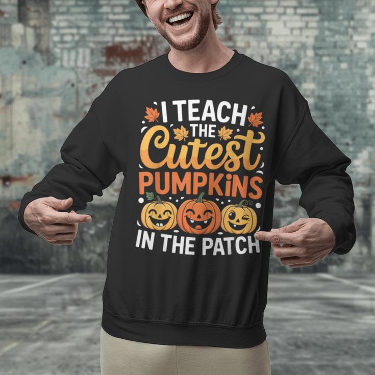 I Teach The Cutest Pumpkins Tshirt Halloween Teacher Unisex Sweatshirt, gift for family, gift for coworker I Teach The Cutest Pumpkins Tshirt Halloween Teacher Unisex Sweatshirt, gift for family, gift for coworker