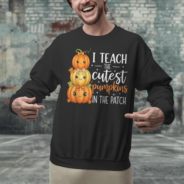 I Teach The Cutest Pumpkins In The Patch Fall Autumn Teacher Unisex Sweatshirt, gift for family, gift for coworker I Teach The Cutest Pumpkins In The Patch Fall Autumn Teacher Unisex Sweatshirt, gift for family, gift for coworker