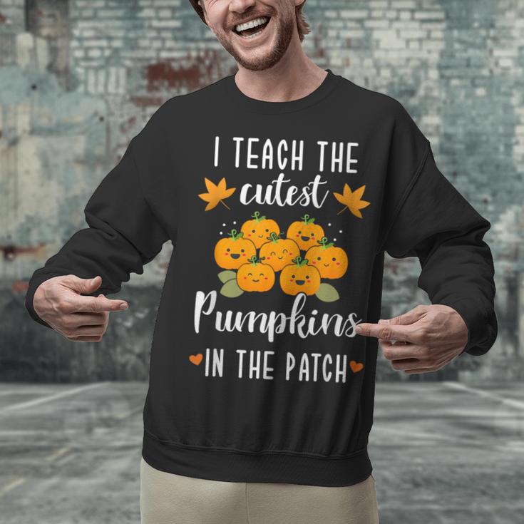 I Teach The Cutest Pumpkins In The Patch Halloween Teacher Unisex Sweatshirt, gift for family, gift for coworker