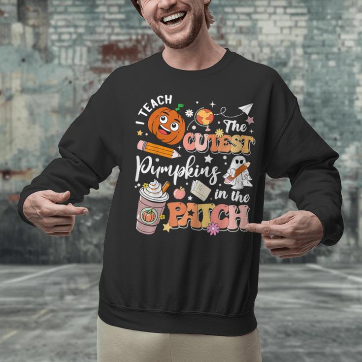 I Teach The Cutest Pumpkins In The Patch Halloween Teacher Unisex Sweatshirt, gift for family, gift for coworker