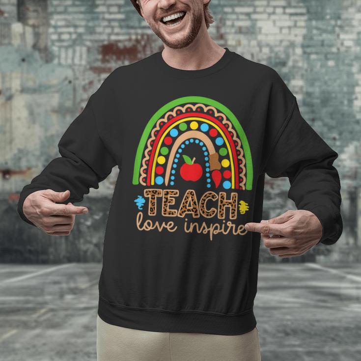 Teach Love Inspire Rainbow Leopard Cheetah Print Teacher Unisex Sweatshirt, gift for family, gift for coworker Teach Love Inspire Rainbow Leopard Cheetah Print Teacher Unisex Sweatshirt, gift for family, gift for coworker