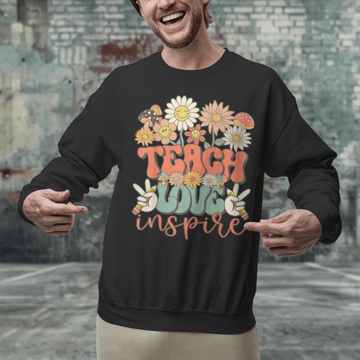 Teach Love Inspire Retro Groovy Daisy Back To School Teacher For Men Women Kids Unisex Sweatshirt, Groovy Teacher Sweatshirts, gift for family, gift for coworker