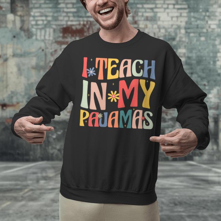 I Teach In My Pajamas Retro Groovy Teacher Humor Unisex Sweatshirt, Groovy Teacher Sweatshirts, gift for family, gift for coworker I Teach In My Pajamas Retro Groovy Teacher Humor Unisex Sweatshirt, Groovy Teacher Sweatshirts, gift for family, gift for coworker