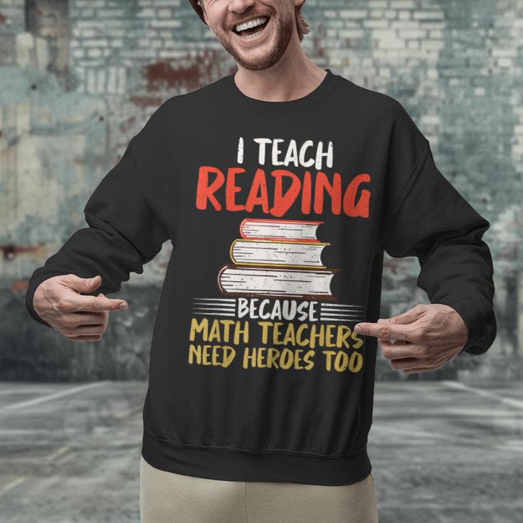 I Teach Reading Because Math Teachers Need Heroes Too Men Women Unisex Sweatshirt, gift for family, gift for coworker I Teach Reading Because Math Teachers Need Heroes Too Men Women Unisex Sweatshirt, gift for family, gift for coworker