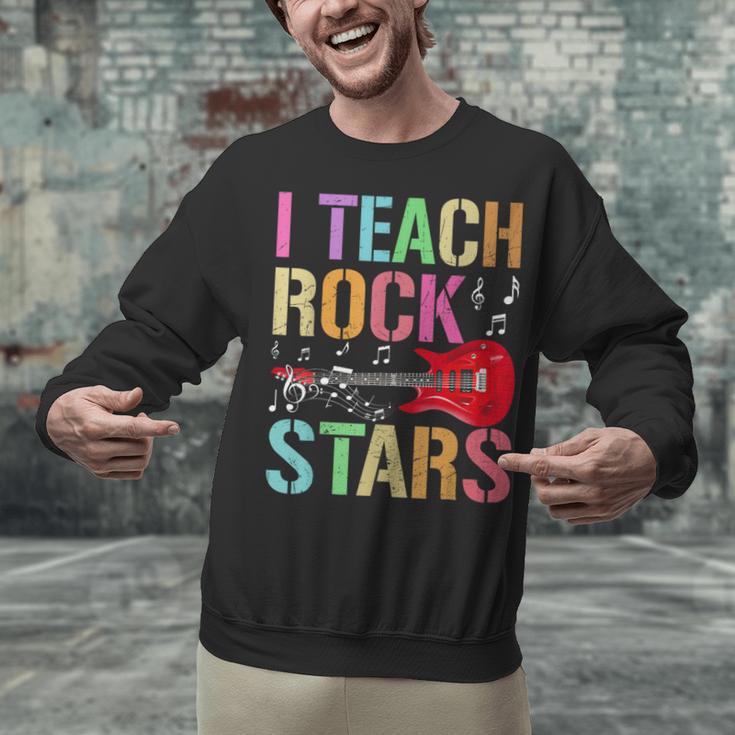 I Teach Rockstars Band Vibes Teacher Rocks My Music Teaching Unisex Sweatshirt, gift for family, gift for coworker I Teach Rockstars Band Vibes Teacher Rocks My Music Teaching Unisex Sweatshirt, gift for family, gift for coworker