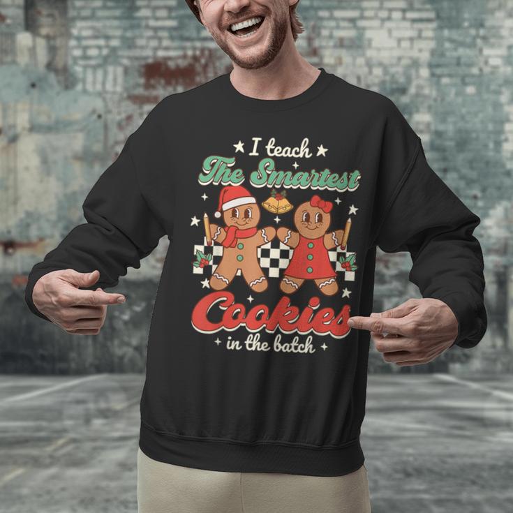 I Teach The Smartest Cookies In The Batch Teacher Christmas For Men Women Kids Unisex Sweatshirt, gift for family, gift for coworker I Teach The Smartest Cookies In The Batch Teacher Christmas For Men Women Kids Unisex Sweatshirt, gift for family, gift for coworker