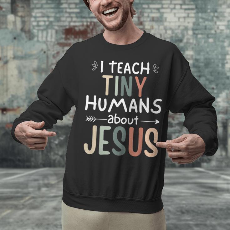 I Teach Tiny Humans About Jesus Teacher Sunday School Faith Unisex Sweatshirt, gift for family, gift for coworker