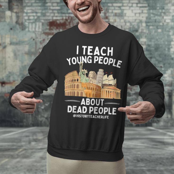 I Teach Young People About Dead People History Teachers Unisex Sweatshirt, History Teacher Sweatshirts, gift for family, gift for coworker
