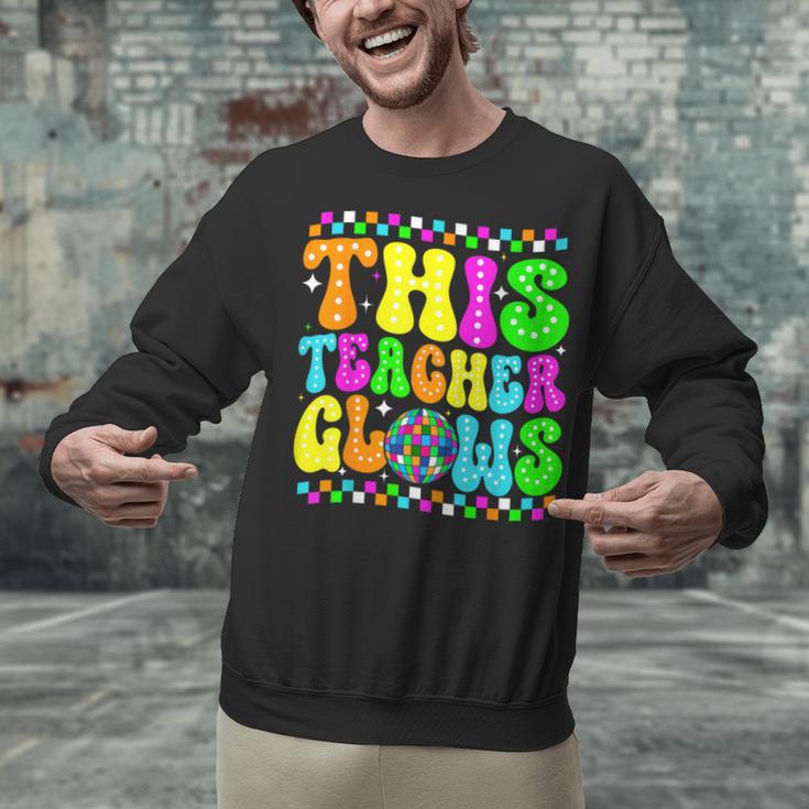 This Teacher 80s 90s Teachers's Day Glows Last Day Of School Unisex Sweatshirt, 90s Teacher Sweatshirts, gift for family, gift for coworker This Teacher 80s 90s Teachers's Day Glows Last Day Of School Unisex Sweatshirt, 90s Teacher Sweatshirts, gift for family, gift for coworker
