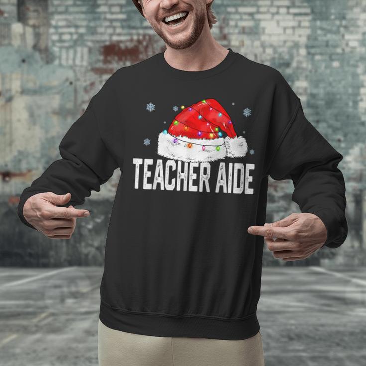 Teacher Aide Christmas Women Family Matching Group Xmas Unisex Sweatshirt, gift for family, gift for coworker Teacher Aide Christmas Women Family Matching Group Xmas Unisex Sweatshirt, gift for family, gift for coworker
