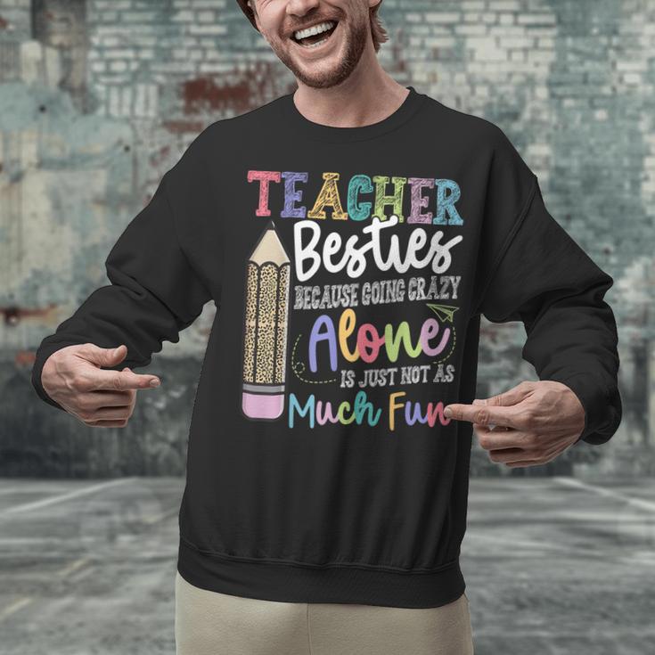 Teacher Besties Because Going Crazy Alone Is Not As Much Fun Unisex Sweatshirt, gift for family, gift for coworker Teacher Besties Because Going Crazy Alone Is Not As Much Fun Unisex Sweatshirt, gift for family, gift for coworker