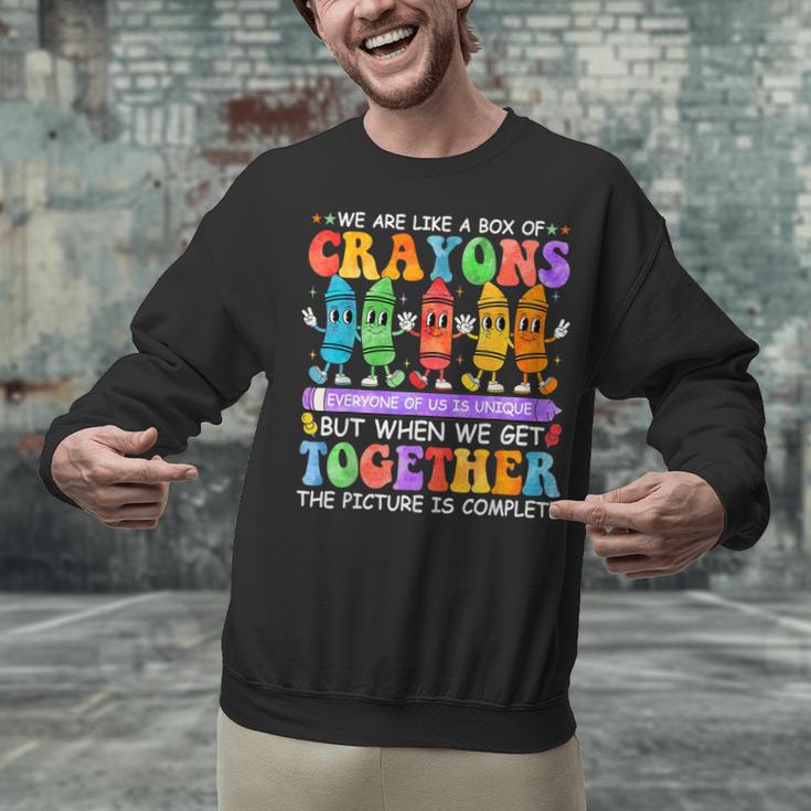Teacher We Are Like A Box Of Crayons Back To School Men Women Kids Unisex Sweatshirt, gift for family, gift for coworker Teacher We Are Like A Box Of Crayons Back To School Men Women Kids Unisex Sweatshirt, gift for family, gift for coworker