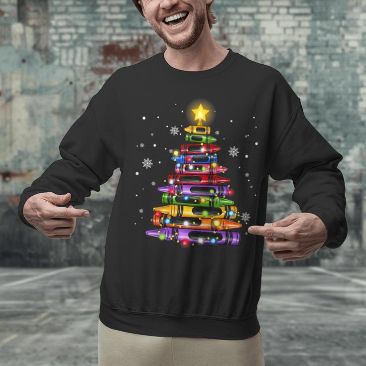 Teacher Crayon Christmas Tree Lights Student School Xmas Unisex Sweatshirt, gift for family, gift for coworker