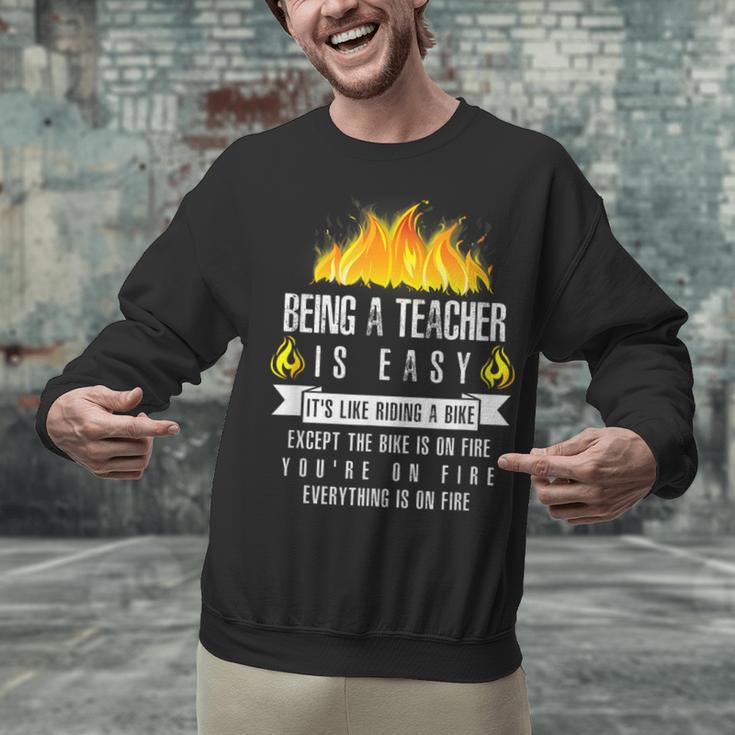 Being a Teacher Is Easy Everything Is On Fire T-Shirt For Men Women Kids Unisex Sweatshirt, gift for family, gift for coworker Being a Teacher Is Easy Everything Is On Fire T-Shirt For Men Women Kids Unisex Sweatshirt, gift for family, gift for coworker