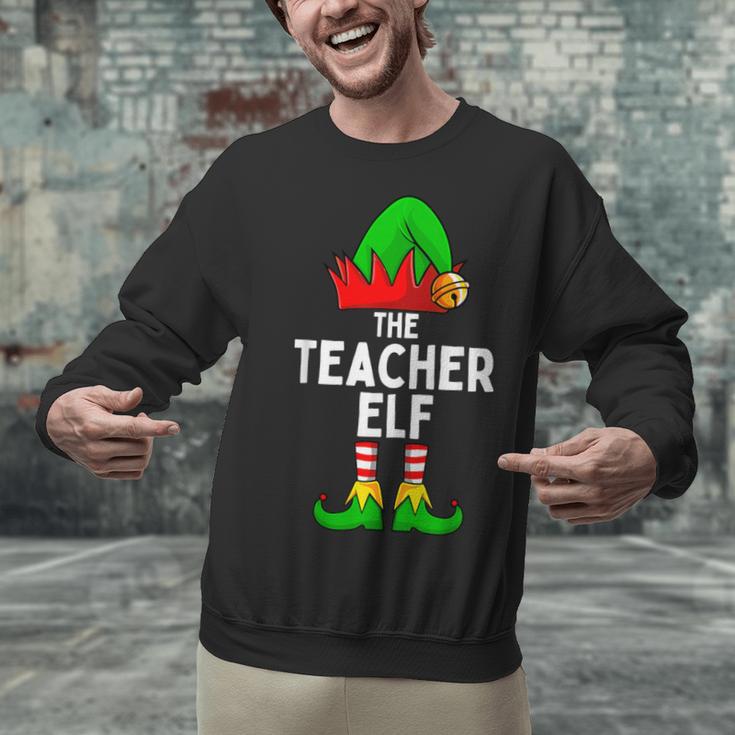 Teacher Elf Matching Family Christmas Women Men Unisex Sweatshirt, gift for family, gift for coworker Teacher Elf Matching Family Christmas Women Men Unisex Sweatshirt, gift for family, gift for coworker
