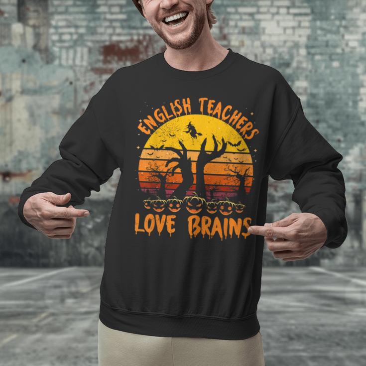Teacher Halloween All English Teachers Love Brains Unisex Sweatshirt, English Teacher Sweatshirts, gift for family, gift for coworker Teacher Halloween All English Teachers Love Brains Unisex Sweatshirt, English Teacher Sweatshirts, gift for family, gift for coworker